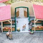 Schleich Horse Barn and Stable Playset - Award-Winning Riding Center 96 Piece Set, 2 Pony Toys, Rider Figurine, and Farm Accessories, for Girls and Boys 3 Years Old and Above - Image 6
