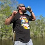 Chill-N-Reel Fishing Can Cooler (from Shark Tank) | Hard Shell Drink Holder with Hand Line Reel Attached | Fits Any Standard Insulator Sleeve or Coozie | Unique Fun Fishing Gift (Camo & Spill Guard) - Image 4
