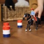 Schleich Farm World 3-Barrel Rodeo Racing Playset - Cowgirl Rodeo Racing Toy Set with Horse, Realistic Western Rodeo Farm Animal Toys and Accessories, 7-Piece Kids Toy for Boys and Girls - Image 4